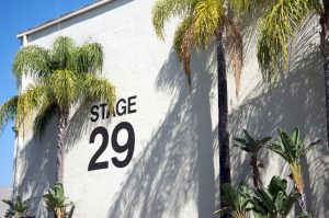 Exterior of stage 29 movie studio with palm trees